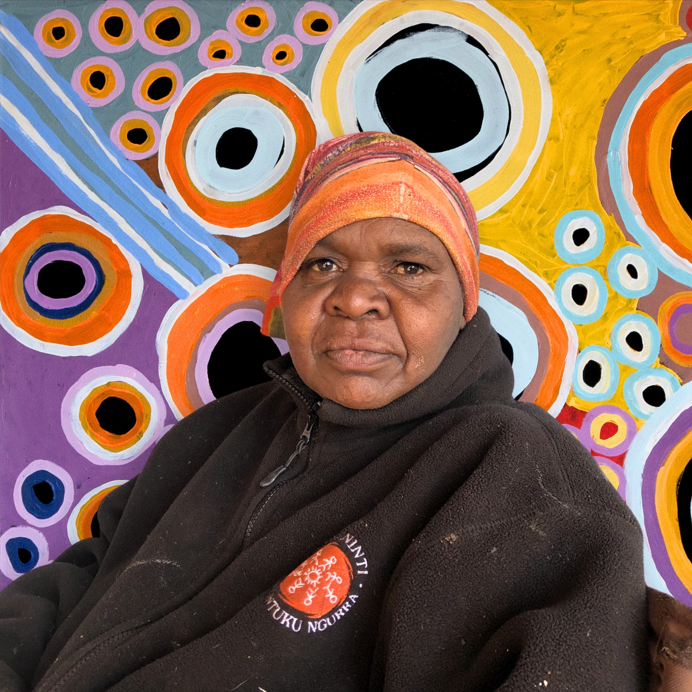 Cuppa Tea with Martumili Artist Sharon Porter: a portrait of Sharon with a recent artwork.